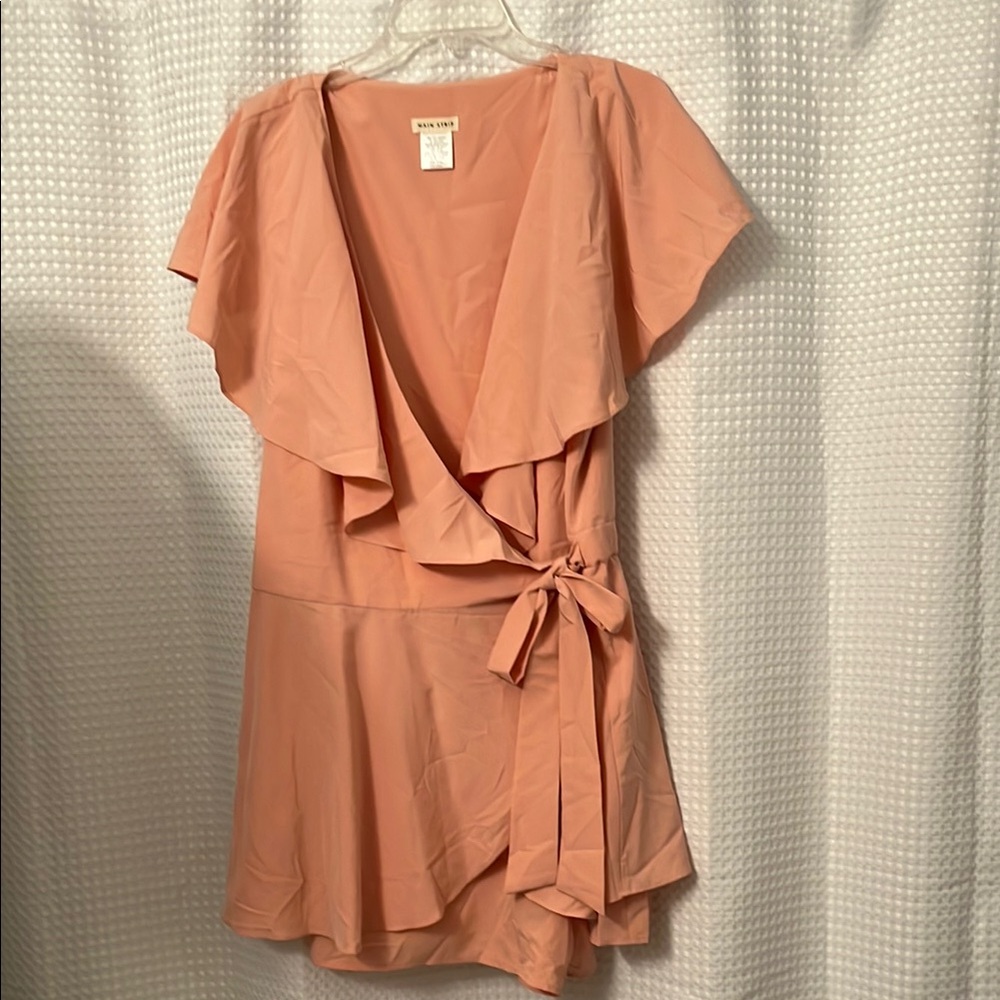 Peach Wrap Romper with Ruffle Detail